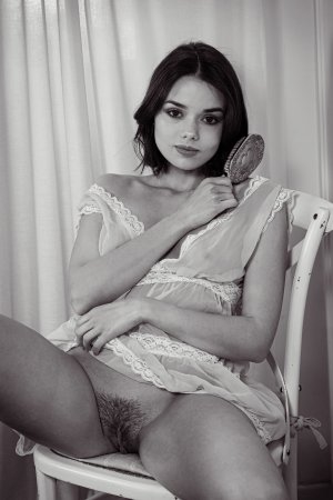 Keira Blue tempts with a seductive touch indoors as her lingerie tease reveals her hairy pussy and perky breasts — Keira Blue #17
