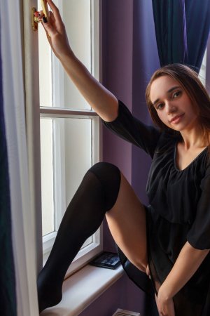 Messiah teases with striptease as dress slides up to show hairy pussy on bed — Messiah #1