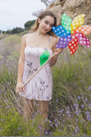 Bozhena outdoors in a short dress spread legs showing hairy pussy — Bozhena #1