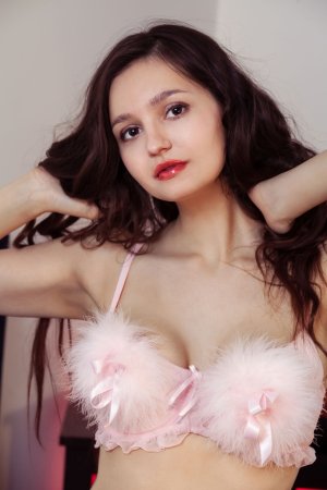 Adeline flaunts her lingerie with a playful smile, spreading legs to tease a glimpse of her hairy pussy — Adeline #1