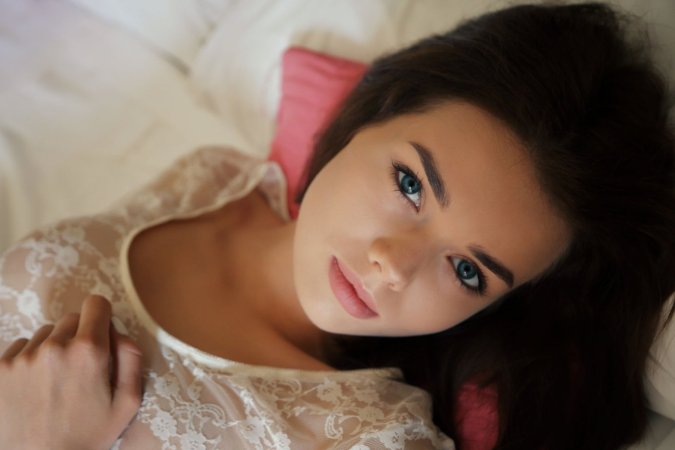 Keira Blue lies on the bed teasing off her lace panties then strips totally to bare her breasts and spread ass — Keira Blue #2