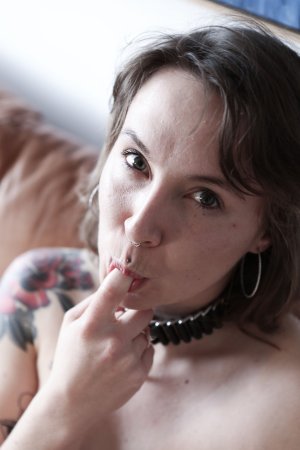Kit Bauer starts masturbating on her couch, then bucks as she stuffed with a curved steel dildo — Kit Bauer #21